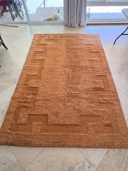 Burnt Orange Wool Rug – 110” x 72” (Barely Used)