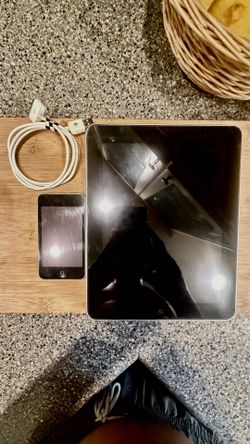 first generation iPod touch 8 GB and first generation iPad 64 GB  and a charger that works for both