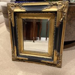 Beautiful Vintage Ornate Black and Gold Mirror