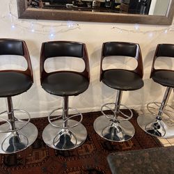 4 swivel counter top chairs