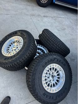 New KMC wheels 17x8.5 6x139.5 35 inch tires New