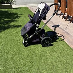 Bugaboo chameleon   Includes cupholder, bassinet and toddler stand, or sit attachment. Machine washable, and videos on YouTube available how to conver