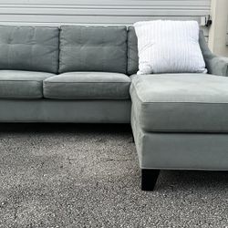 MICROFIBER SECTIONAL SOFA W REVERSIBLE CHAISE by H. M. RICHARD’S - delivery is negotiable