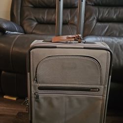 Tumi carryon size rolling luggage 
