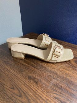 New. Never worn. Size 8 sandal.