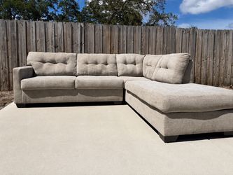 Ashley Mahoney 2-Piece Sectional w/ Chaise – 105” – $299
