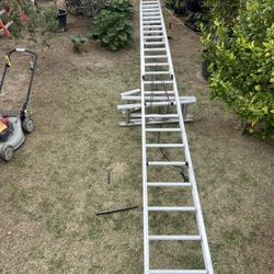 48 ft Werner Aluminum Extension, new, 300 lbs capacity. It has a small detail on the top and bottom of the third step; it's a little dented but it doe
