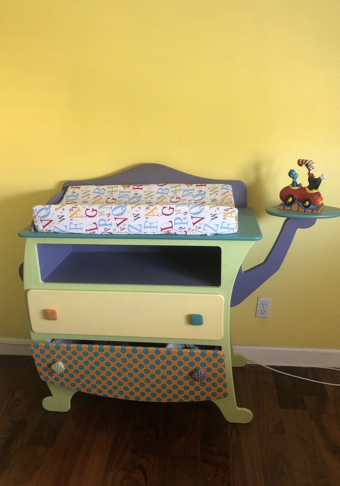 Baby changing table and dresser Dr Sesuss Themed. The changing pad can be removed.