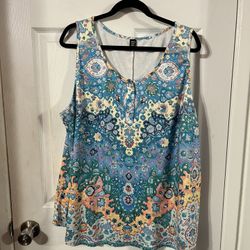 Women’s Size 5X (looks like it runs small more like a 3X) Tunic Length sleeveless top.  Brand new never wore.  