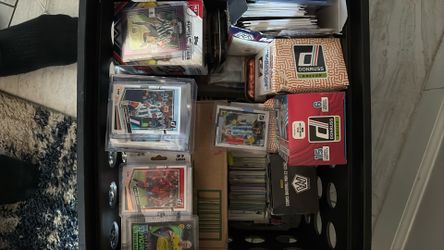 While box of cards more than 300 sports cards including soccer baseball and football