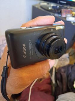 Canon powershot SD1400is digital camera working missing charger