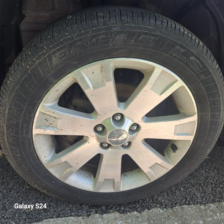 18" ALUMINUM WHEELS AND TIRES...