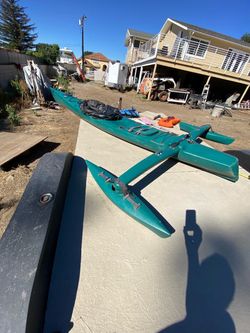 14’ Kayak with 2 outrigger Tribalance life jackets oats throw pillows no cracks or leaks $150  cash in Upland 91784