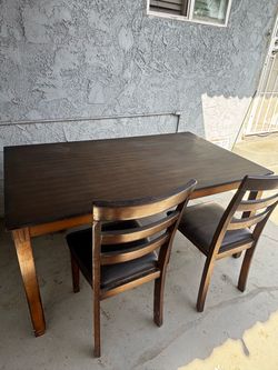 Ashley Coviar Dining Set in Brown