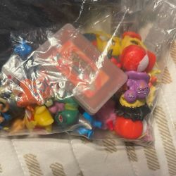 Pokémon Game And Pokémon Figurines Take All For 20 Dlls 