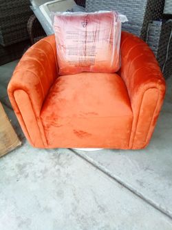 Orange swivel chair Orange furniture orange barrel swivel chair orange velvet chair accent chair velvet Orange used as a display