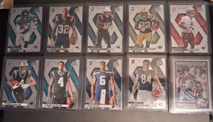 Ten different 2025 NFL Rookie cards in sleeves and top loaders