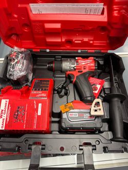 Milwaukee hammer drill kit - price is firm
