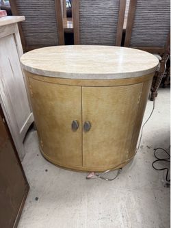 Thomasville cylinder storage side table features a bleached burlwood veneer body and a marble top - 30” x 22” x 28”