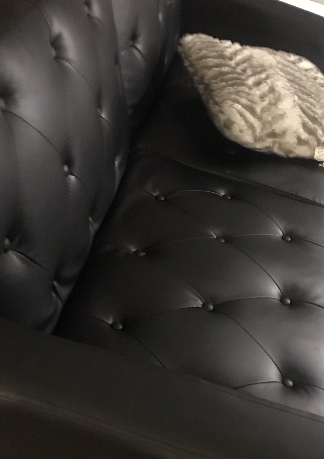 LEATHER CONVERTIBLE SOFA