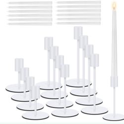 Set of 12 white metal candlesticks and white taper candles