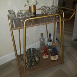 Gold and wood rolling Bar cart