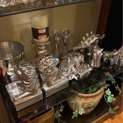Silver coated items. See all pictures. Various prices. Inquire if interested