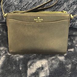 Kate spade crossbody black leather bag.