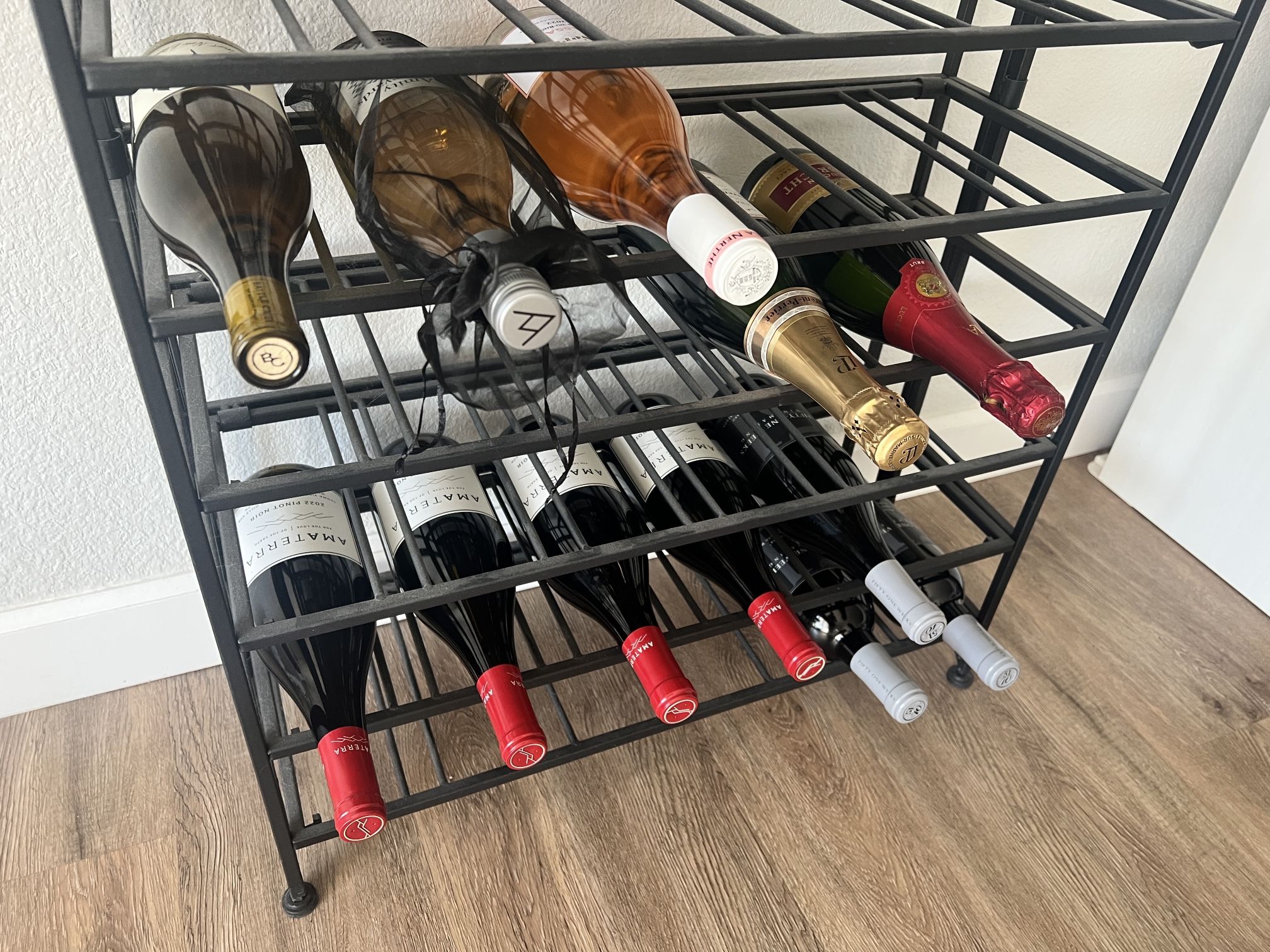 Excellent Condition: Black Metal 54 Bottle Wine Rack