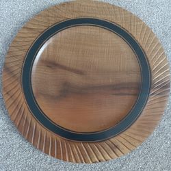 wooden decorative plate with black accent