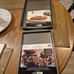 Two brand new mainstays nonstick cookie pans