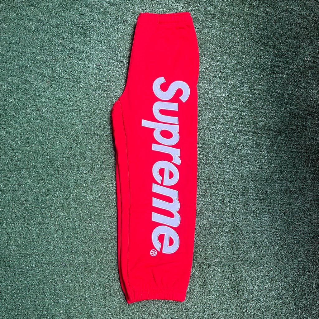 Red supreme pants