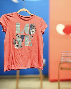 Girl's T-shirt, size 14 — excellent condition.