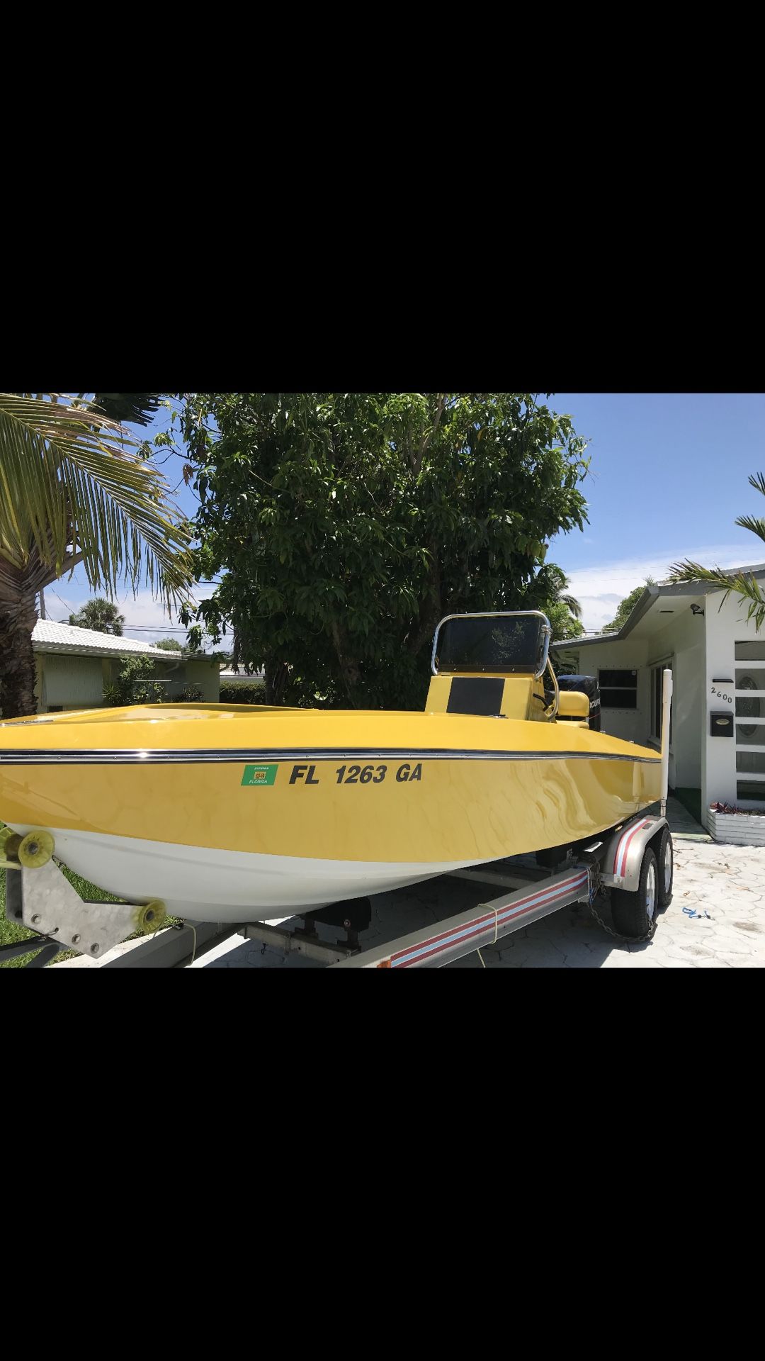 21’ Paramount boat with a 300 hp Mercury Motor and Trailer. Great shape. $7500 firm!