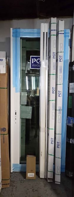 Brand New 74W x 94H PGT Impact Double French Doors with Frame, Trims and Handles.