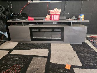 Gray fire place led TV stand for $80