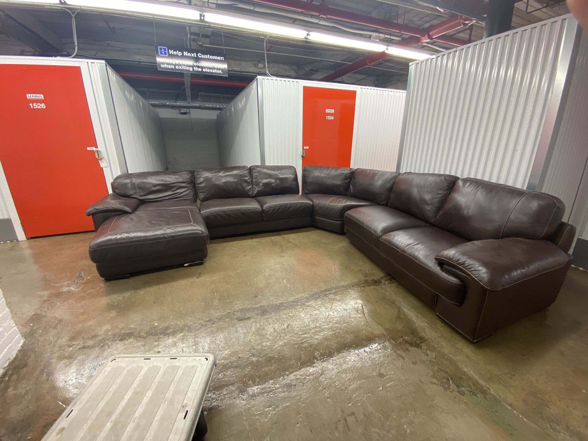 Brown Leather sectional couch