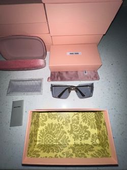 Miu Miu Clear Lens Sunglasses