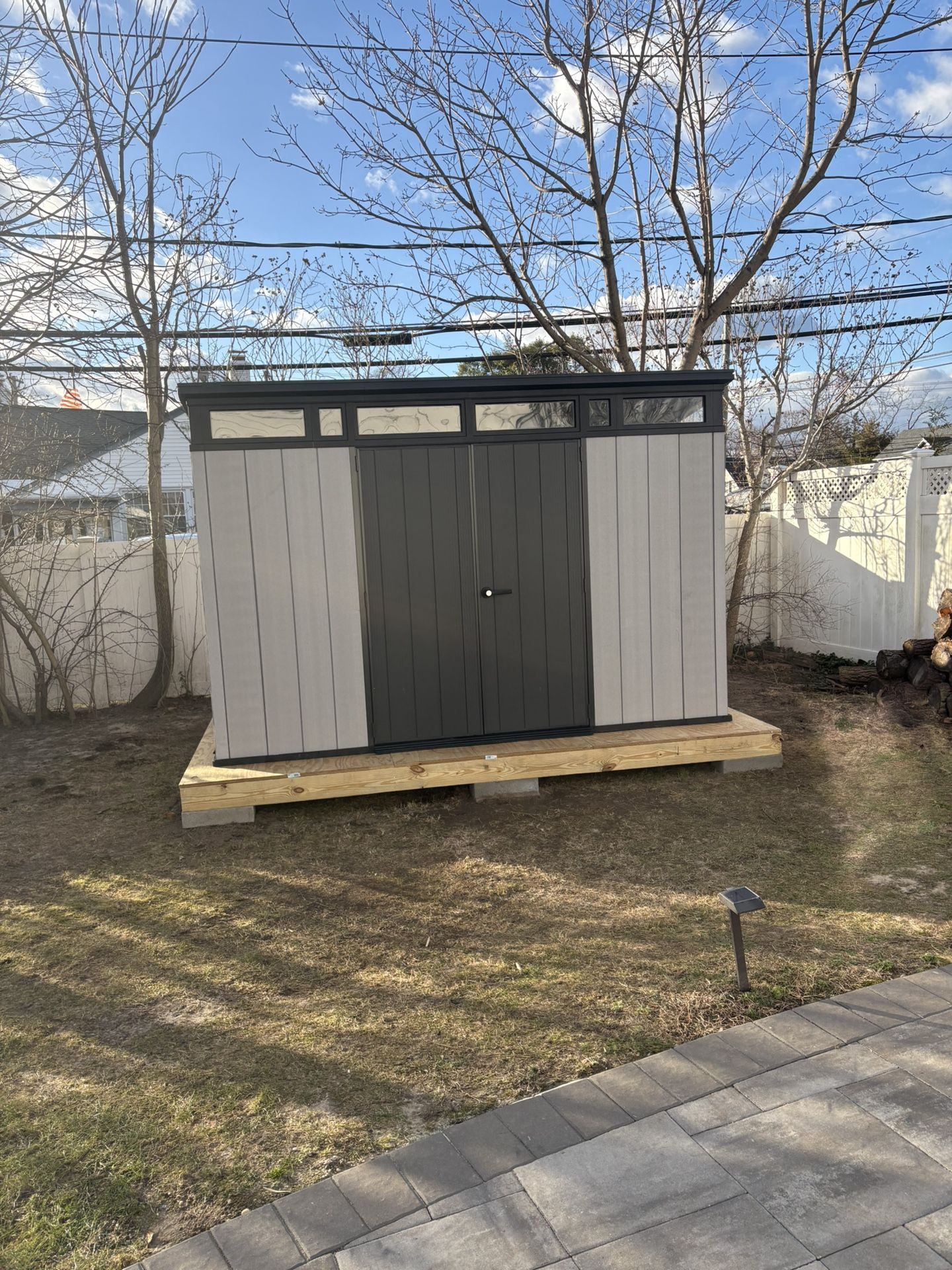 Shed Assembly With Base Construction