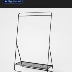 Three Black Clothes Racks