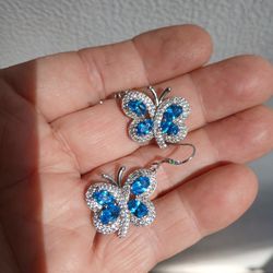 Bella Luce Rhodium Over Sterling Silver Earrings. 1" drop