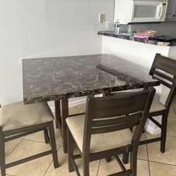 Dining room table and chairs