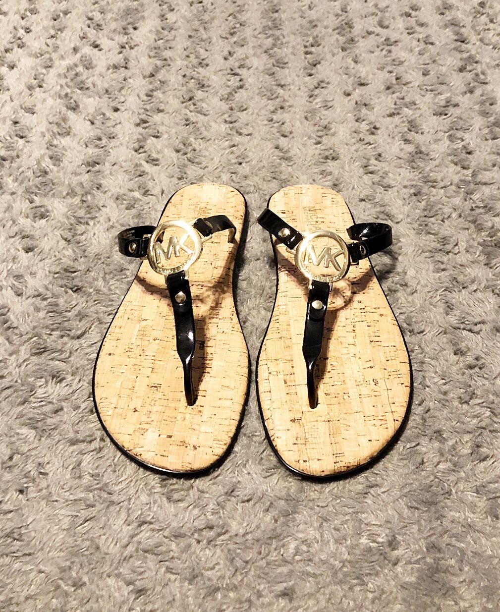 New! Women’s Michael Kors sandals paid $75 size 9 Brand New never worn. Michael Kors Womens MK Charm Jelly Sandal Black with Gold Hardware.