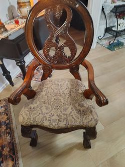 Ornate Carved Wood Armchair with Upholstered Seat