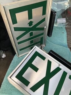 Electric light Exit signs.