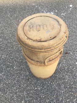 Antique hood milk container