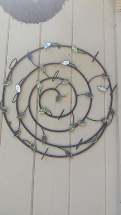 Wall decoration with glass cup for tea light candles