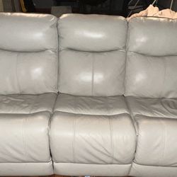 Leather power Reclining sofa. Perfect Condition 