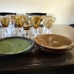 Nine beautiful glasses 🍷🍷and five large 🍛🍛plates