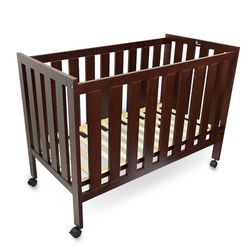 brown crib for baby 🙃
